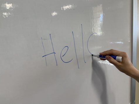 Don’t turn away from this lonely whiteboard... throw a little pizazz on his face with some marker. 