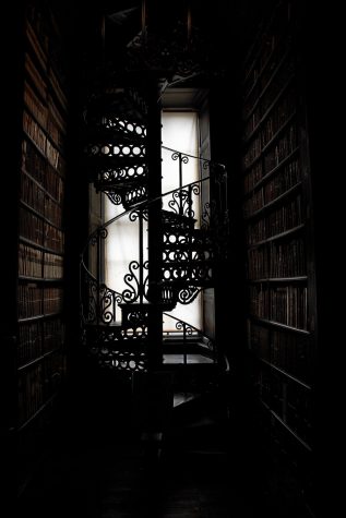 Silhouette of a library staircase. Photo from Pixabay and Pexels, Free to use (CC0). 