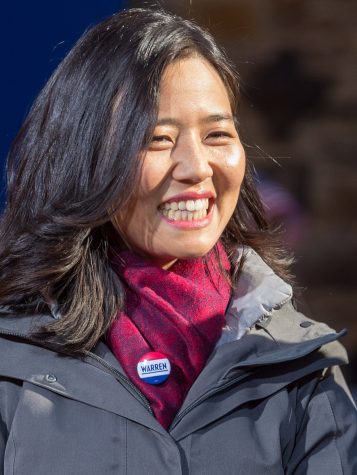 Michelle Wu, Boston City Council Member, wears a button supporting Elizabeth Warren for President. Taken at the Warren campaign announcement in Lawrence, Massachusetts, February 9, 2019.