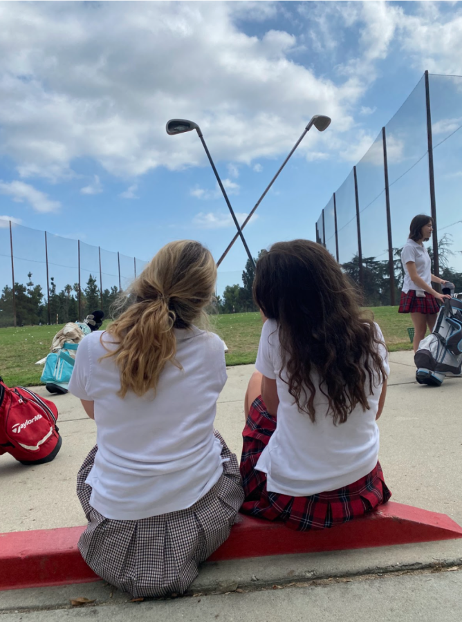 Allison Erickson (‘23) and Kiki Velasquez (‘24) bonding over their love of golf captured by Danica Bachman ‘24 