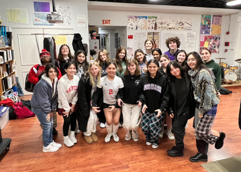 The cast of High School Musical poses for a picture during rehearsal. Photo by Ms. Householder