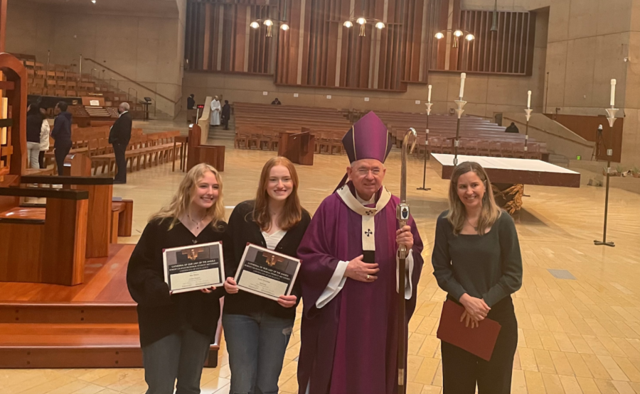Photographed above are visual artists Mia Mayer ‘24 and Lucia Derriman ‘24, Archbishop José H. Gomez, and Studio Art Conservatory instructor Amy Green. 