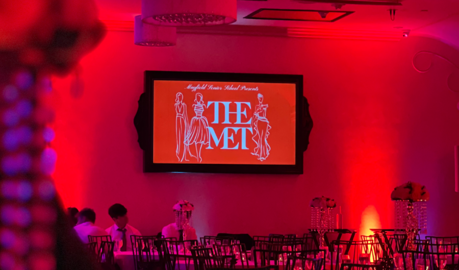 The+Mayfield+Prom+venue%2C+Noor%2C+lit+with+red+lights+and+adorned+with+a+screen+that+features+%E2%80%9CThe+Met%E2%80%9D+sign.