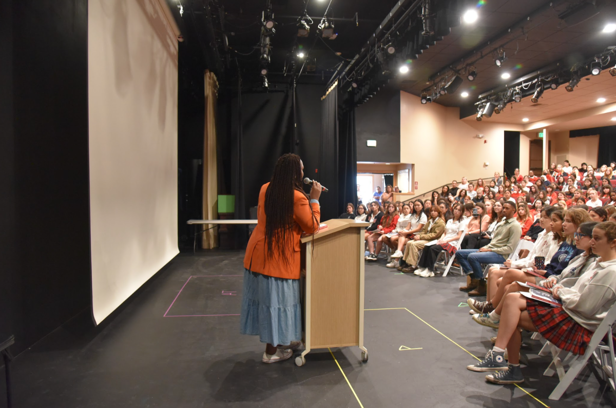 Dydine Umunyaya shares a message of love and compassion with students at Mayfield Senior School.

Photo Credits: Mayfield Crier