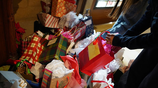 Photo taken on December 18, during Kris Kinds week as a student searches for their gift.
