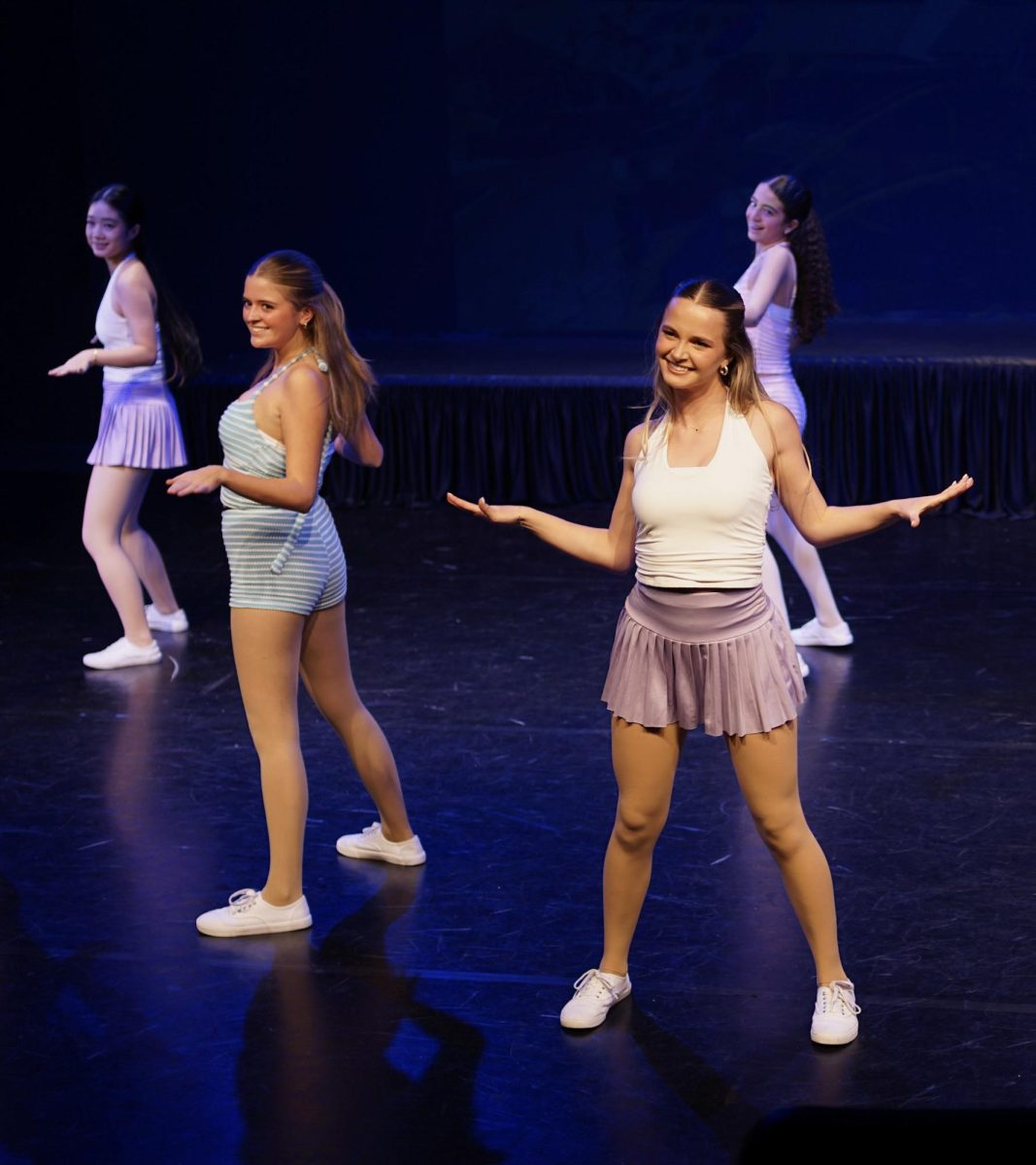 (From left to right) Eudora Yutong Yuan '28, Lacy Snaer '28, Alexandra Mason '28, and Stella Awad perform in an upbeat melody paying tribute the California Coast. 