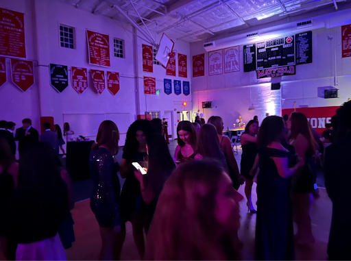 Mayfield students gather in the gym for a night of friends, food, and dancing. Photo Credit: Mayfield Crier
